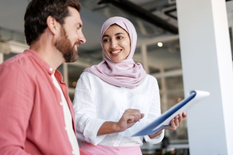 man and woman in conversation